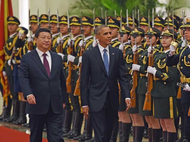 Obama e Xi Jinping durante cerimônia em Pequim. (Foto: Greg Baker / AFP Photo)