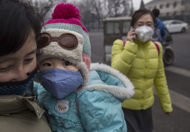 Poluição na China : Pequim entra em alerta vermelho devido ao nível de poluentes no ar (Foto: Kevin Frayer/Getty Images)