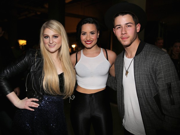 Meghan Trainor, Demi Lovato e Nick Jonas em show em St Paul, Minnesota, nos Estados Unidos (Foto: Tasos Katopodis/ Getty Images)