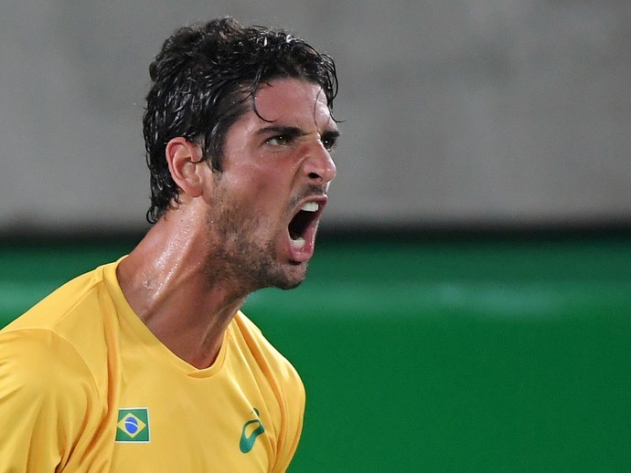 Bellucci em jogo contra Cuevas (Foto: Toby Melville/Reuters) Bellucci em jogo contra Cuevas (Foto: Toby Melville/Reuters)
