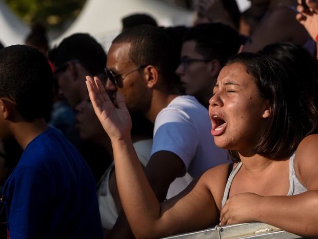 Fiéis se emocionam na Marcha para Jesus em São Paulo (Foto: Flavio Moraes/G1)