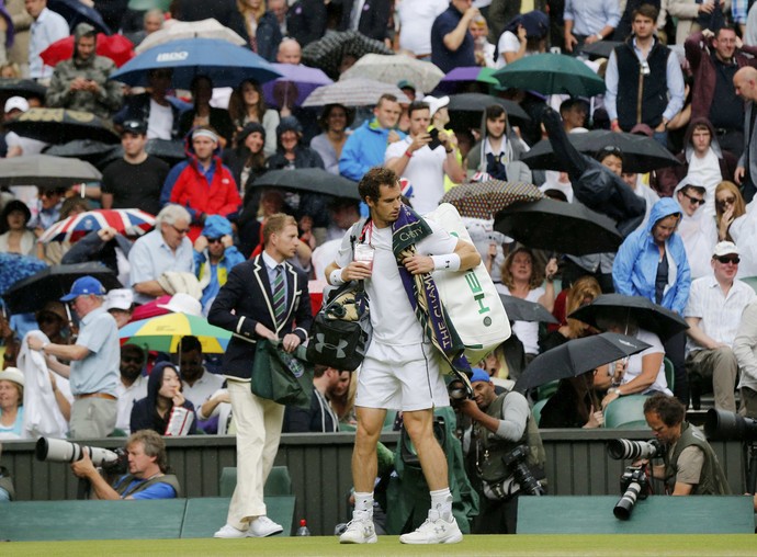 tênis chuva quadra central Pospisil x Murray Wimbledon (Foto: Reuters)