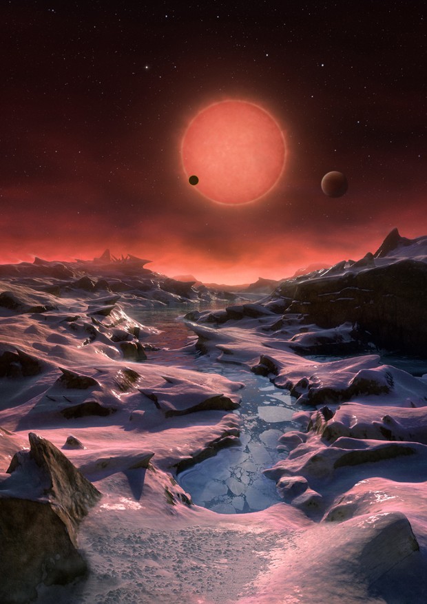 Ilustração artística mostra como seria a superfície de um dos três planetas que orbita uma estrela anã ultrafina que fica a apenas 40 anos luz da Terra (Foto: ESO/M. Kornmesser/AP)