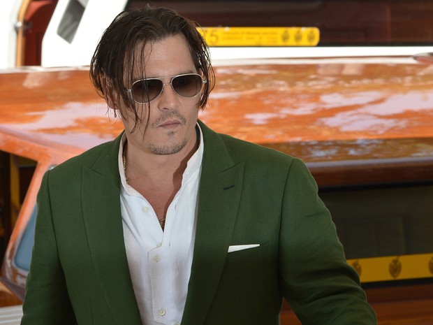 04/09: Johnny Depp chega ao Festival de Veneza para divulgar o filme 'Black mass' (Foto: AFP PHOTO/TIZIANA FABI) 04/09: Johnny Depp chega ao Festival de Veneza para divulgar o filme 'Black mass' (Foto: AFP PHOTO/TIZIANA FABI)