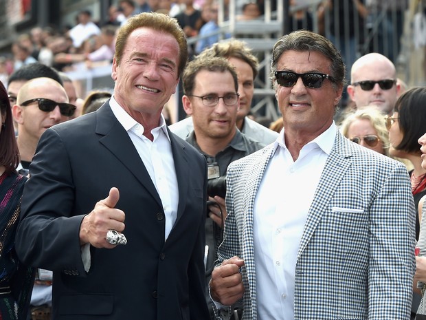 Arnold Schwarzenegger e Sylvester Stallone em première em Los Angeles, nos Estados Unidos (Foto: Kevin Winter/ Getty Images/ AFP)