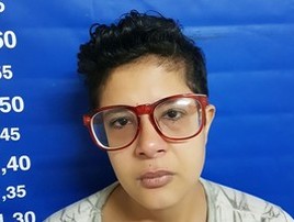 Mulher é presa sob a acusação de matar o pai por R$ 700 mil (Divulgação/Polícia Civil)