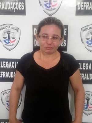 Telma Lúcia Silva Aguiar foi presa suspeita de estelionato e uso de documentos falsos (Foto: Polícia Civil / Divulgação)