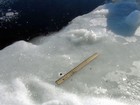 Mergulhadores exploram lago russo que teria sido atingido por meteoro