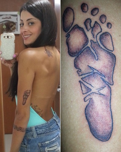 Aline Riscado faz tatto em homenagem ao filho (Foto: Domingão do Faustão / TV Globo)
