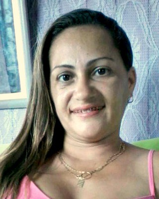 Ocineide Silva Menezes, de 31 anos, tinha quatro filhos. Marido é suspeito de tê-la matado com 18 facadas (Foto: Arquivo da Família)