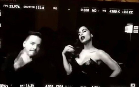 J Balvin e Anitta no clipe da nova canção deles, que terá parte das cenas e preto e branco (Foto: Reprodução) J Balvin e Anitta no clipe da nova canção deles, que terá parte das cenas e preto e branco (Foto: Reprodução)