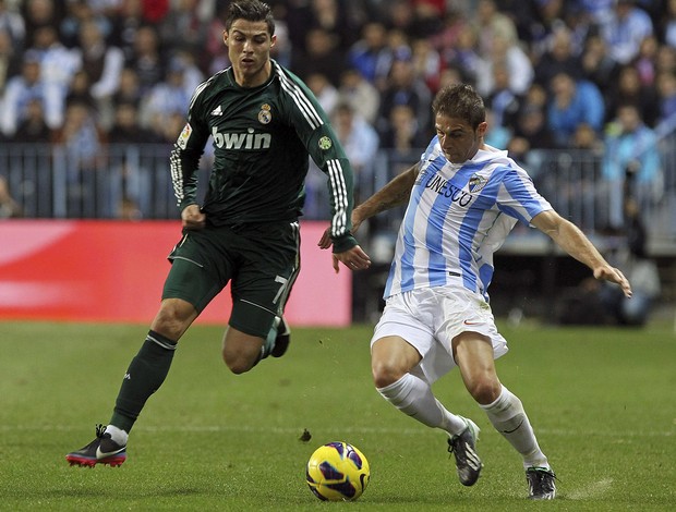 Cristiano Ronaldo e Joaquin Sanchez Real Madrid x Malaga (Foto: EFE)