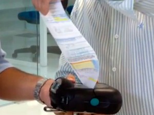 No RN, Cosern implanta sistema que imprime extrato de pagamento na hora da leitura (Foto: Reproduío/Inter TV Cabugi)