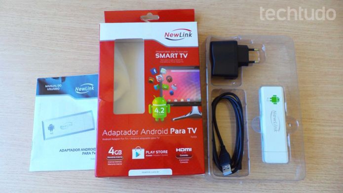 Caixa, manual e acessórios do adaptador com Android para TV da Newlink (Foto: Reprodução / Dario Coutinho) Caixa, manual e acessórios do adaptador com Android para TV da Newlink (Foto: Reprodução / Dario Coutinho)