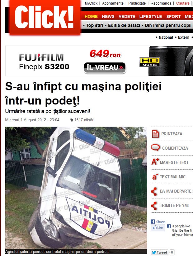 Carro da polícia ficou entalado em um bueiro na Romênia. (Foto: Reprodução/Click!)