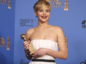 Jennifer Lawrence vence o prêmio de melhor atriz coadjuvante no 71º Globo de Ouro, que acontece neste domingo (12), em Los Angeles. (Foto: REUTERS/Lucy Nicholson)