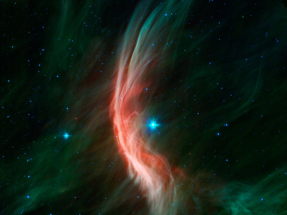 Imagem infravermelha feita pelo telescópio Spitzer, da Nasa, mostra estrela Zeta Ophiuchi envolta de poeira (Foto: NASA/JPL-Caltech)