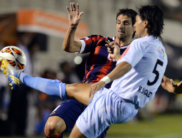 Rodrigo Lopez e Rolando Bogado, Real Garcilaso x Cerro Porteno (Foto: AFP)