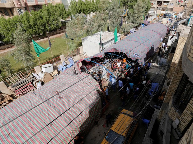 Homem-bomba provoca explosão em distrito no norte de Bagdá, neste sábado (15) (Foto: Ahmed Saad/Reuters)