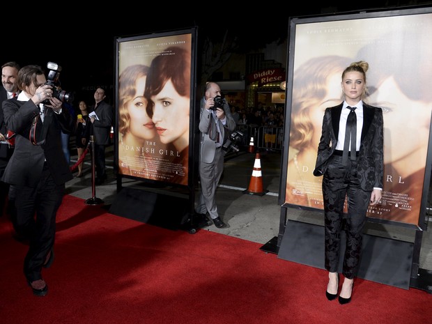Johnny Depp e a mulher, Amber Heard, em première de filme em Los Angeles, nos Estados Unidos (Foto: Kevork Djansezian/ Reuters)