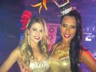 Ex-BBBs Cacau e Kelly participam de evento carnavalesco