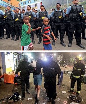 NAS RUAS Policiais na Rocinha, no Rio (acima), e ação da polícia em Londres,  em 2011. Os mesmos desafios estão presentes no Brasil  e no exterior (Foto: Antonio Scorza/AFB )