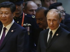 O presidente chinês, Xi Jinping, e seu colega russo, Vladimir Putin, em evento nesta terça-feira (20) na China (Foto: Aly Song/Reuters)