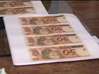 Homem é flagrado imprimindo notas falsas de R$ 50 e R$ 100 no Paraná