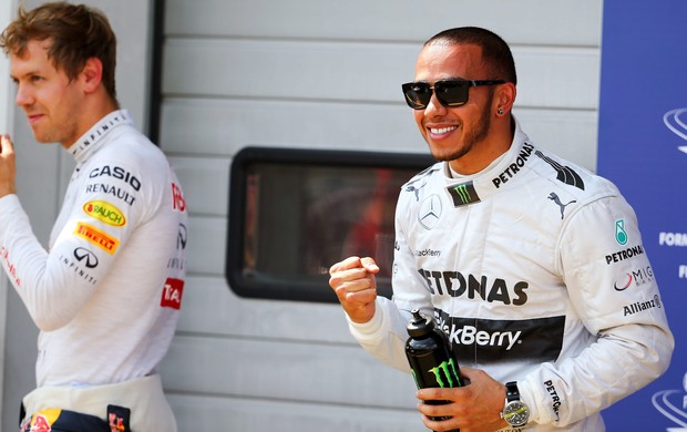 Lewis Hamilton e Sebastian Vettel após treino classificatório para o GP da Alemanha (Foto: EFE)