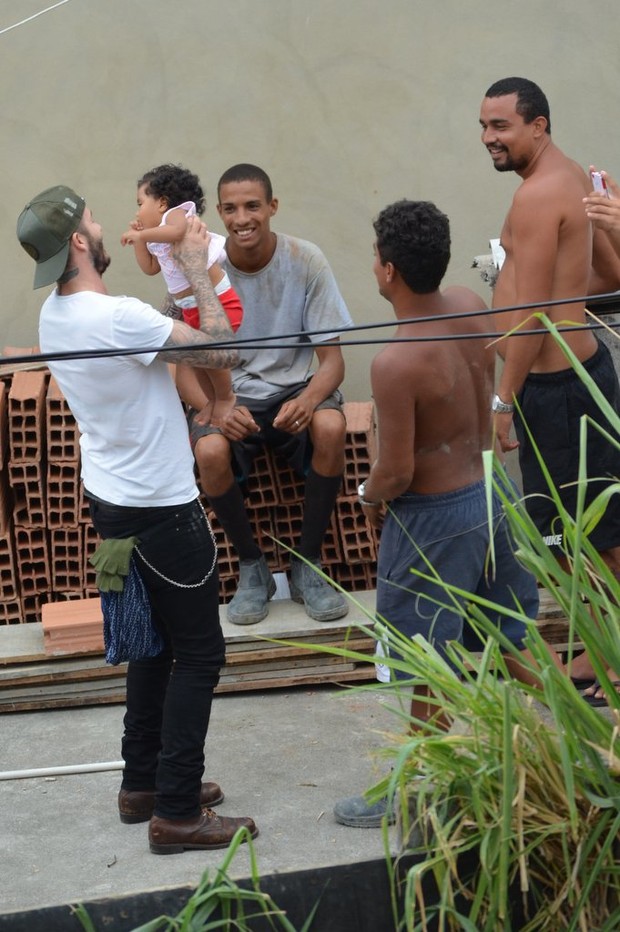 David Beckham no Vidigal (Foto: Rodrigo dos Anjos e Delson Silva / AgNews)