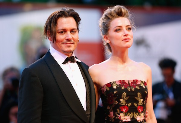 O ator Johnny Deppe e a atriz e modelo Amber Heard (Foto: Getty Images)