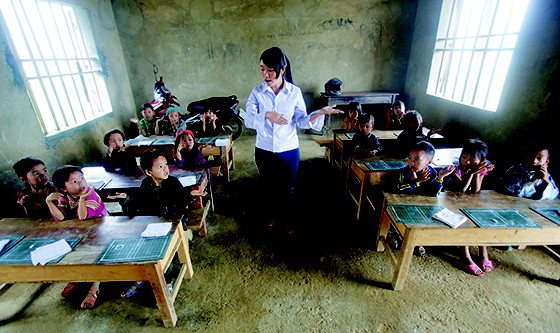 Escola em Hanoi (Foto: Nguyen Huy Kham/Reuters)