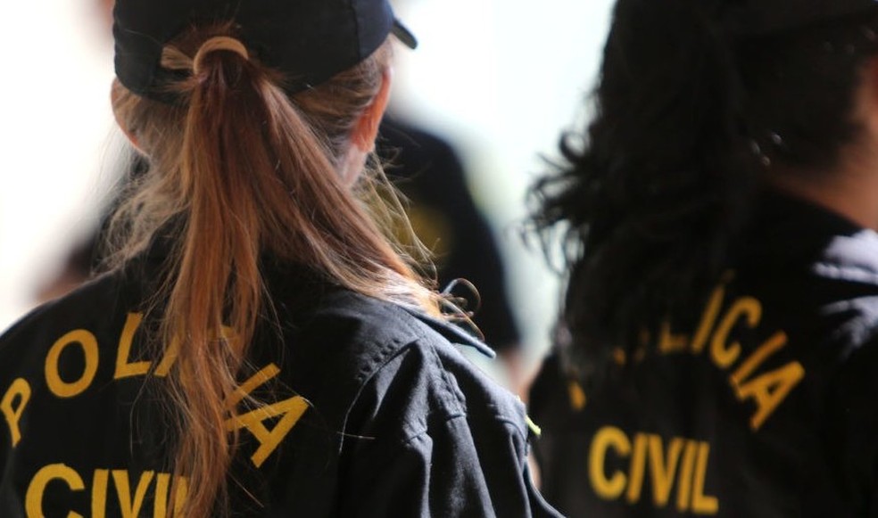Policiais civis em delegacia (Foto: Divulgação/ Secom)