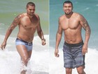 Com menos 16 quilos, Naldo se exercita e 'pega jacaré' na praia no Rio