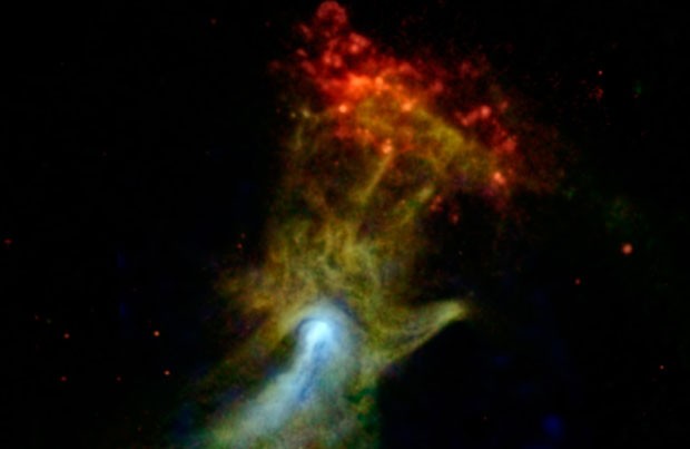 Imagem registrada pelo Telescópio Nuclear Epectrocópico, o Nustar, mostra os restos energizados de uma estrela morta, uma estrutura apelidade de “Mão de Deus”, devido ao formato semelhante ao de uma mão. (Foto: NASA/JPL-Caltech/McGill)