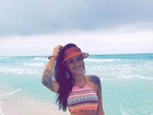Monique Amin curte férias em Cancún e exibe curvas generosas