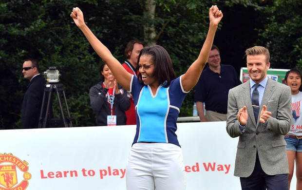 Michelle Obama e Beckham em evento em Londres (Foto: AFP)