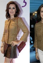 Alessandra Maestrini repete casaco dourado em menos de 24 horas