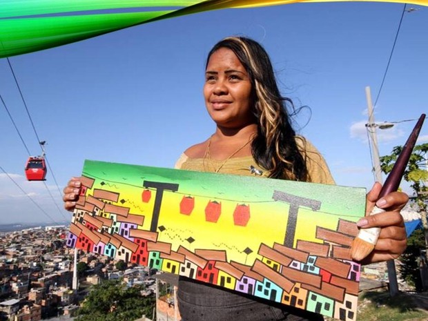 Mariluce Mariá luta para manter o projeto social Favela Art, onde faz pinturas urbanas e em quadros, junto com crianças e adolescentes do Complexo do Alemão, (Foto: Reprodução/Redes Sociais) Mariluce Mariá luta para manter o projeto social Favela Art, onde faz pinturas urbanas e em quadros, junto com crianças e adolescentes do Complexo do Alemão, (Foto: Reprodução/Redes Sociais)