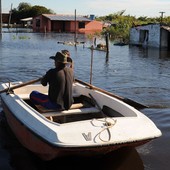 Inundações matam duas pessoas no Paraguai (Inundações matam 2 no Paraguai (Inundações matam 2 e afetam 150 mil no Paraguai (Inundações matam dois no Paraguai (Norberto Duarte/AFP))))