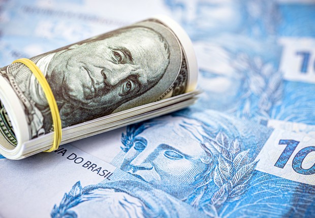 dolar e real, fluxo cambial,  (Foto: RHJ / Getty Images)
