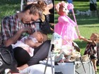 Jessica Alba dá mamadeira para a filha durante passeio no parque