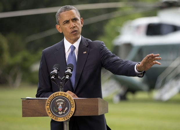 O presidente dos Estados Unidos, Barack Obama, fala nesta sexta-feira (13) sobre o Iraque em discurso na Casa Branca (Foto: Pablo Martinez Monsivais/AP)