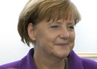 Merkel pede que Putin pressione separatistas (Ng Han Guan/AP)
