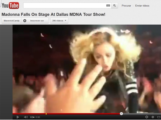 Imagem de vídeo no YouTube que mostra Madonna caindo no palco em show em Dallas, EUA, no domingo (21) (Foto: Reprodução/YouTube)