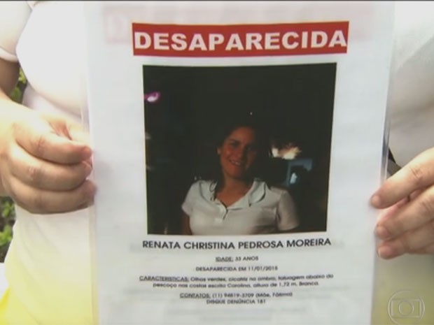 Companheira mostra foto de Renata, que está desaparecida (Foto: TV Globo/Reprodução)