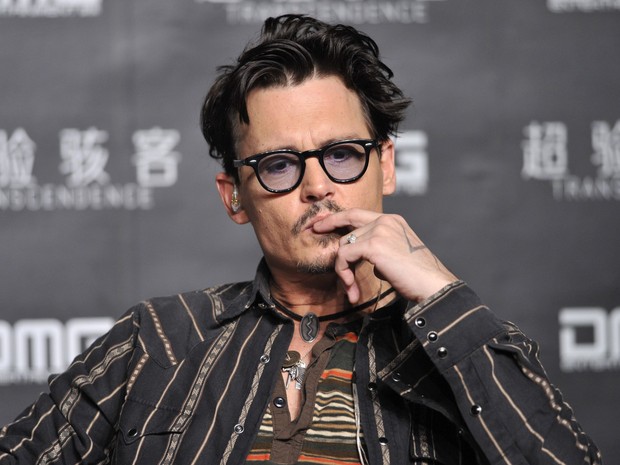 Johnny Depp em coletiva de filme em Pequim, na China (Foto: Stringer/ Reuters)