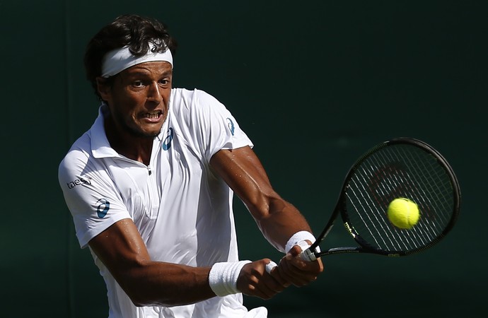 Santiago Giraldo e João Souza, o Feijão, em Wimbledon (Foto:  JUSTIN TALLIS/AFP/Getty Images)