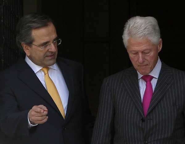 Primeiro Ministro grego e Bill Clinton conversaram sobre a crise grega (Foto: Angelos Tzortzinis/AFP)