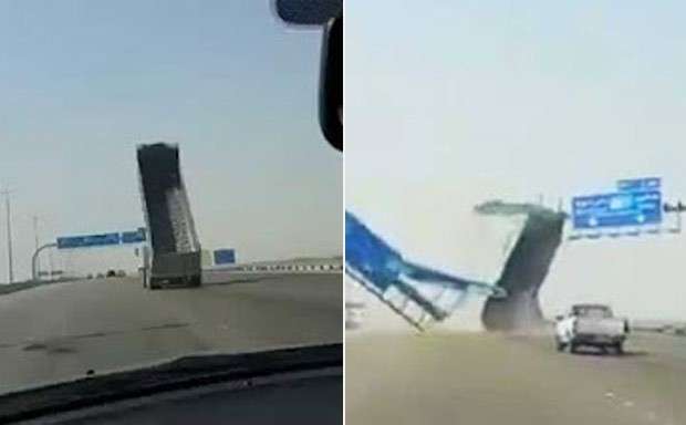 Motorista de caminhão caçamba destruiu sinalização de estrada em Dannan (Foto: Reprodução/YouTube)